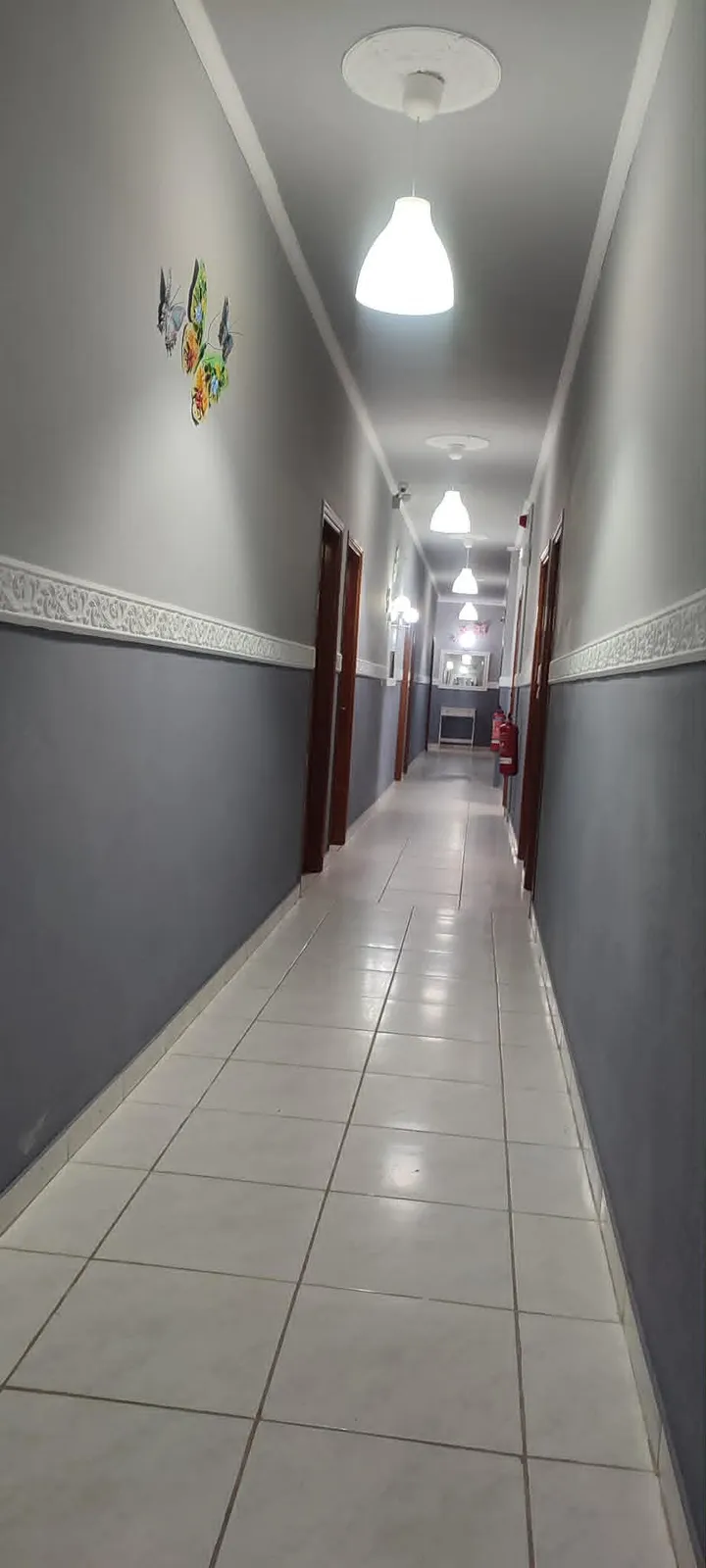Bright interior corridor of The Port Hotel