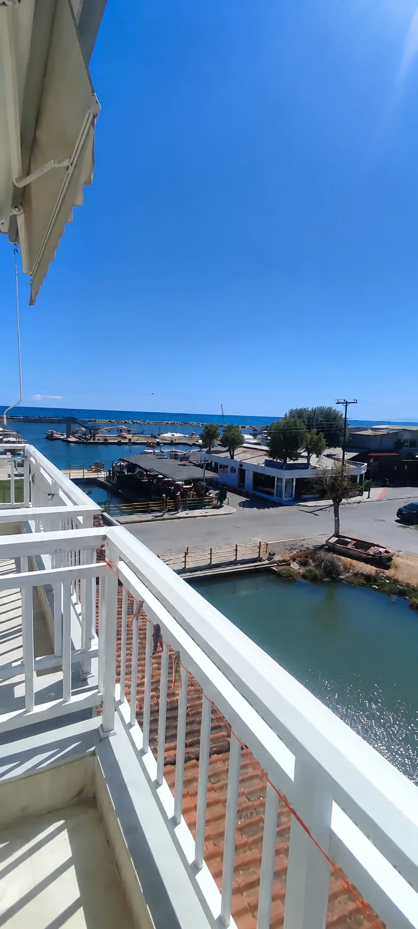 Private balcony with sea and harbour view