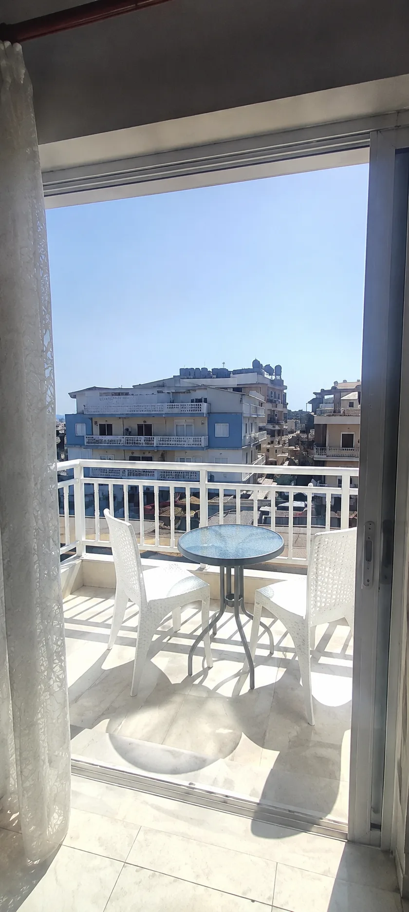 Balcony with table and chairs