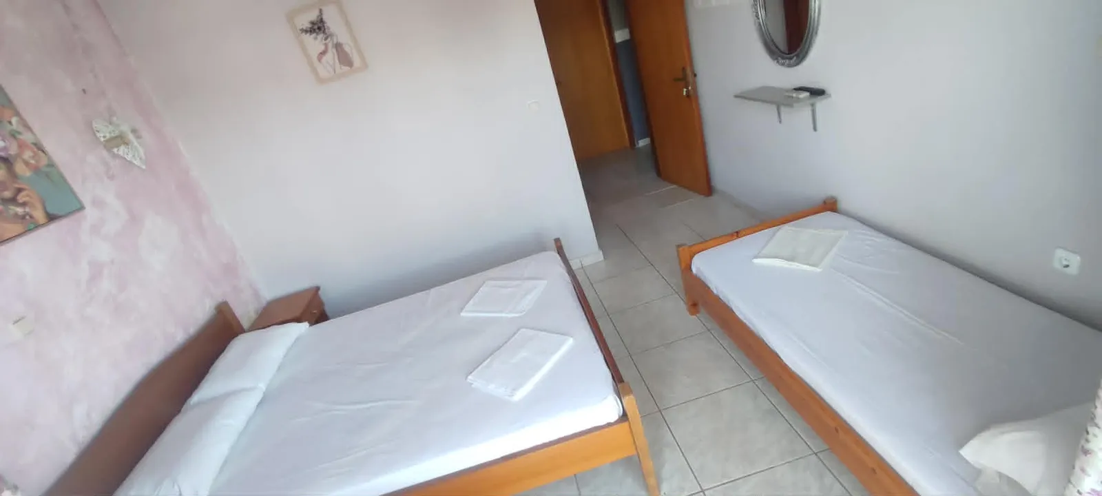 Bright family room with twin beds at The Port Hotel